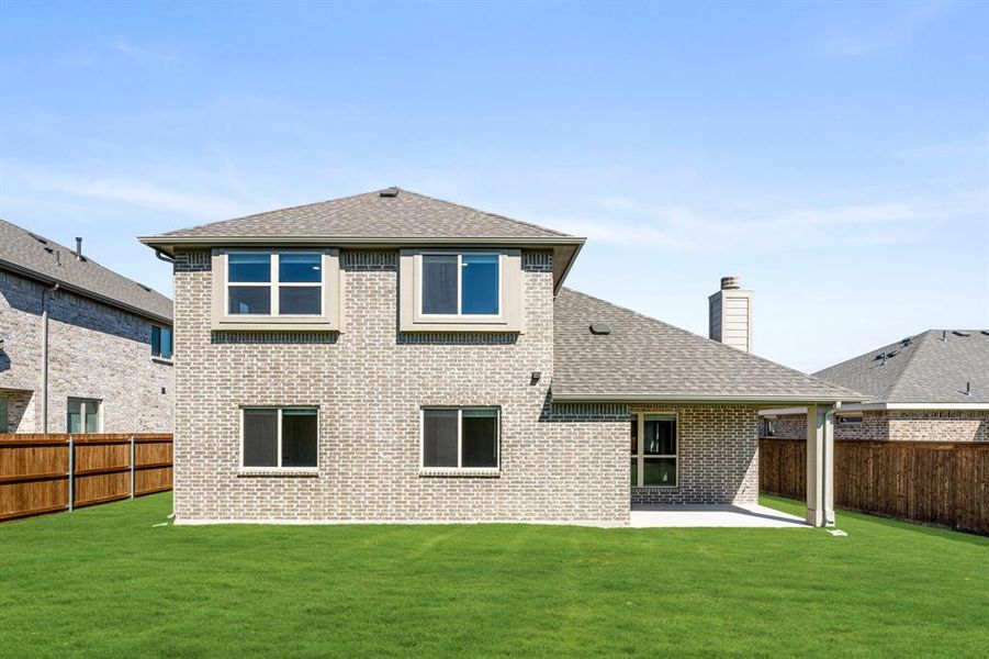 Exterior details and patio area of a home in Waterscape Classic 60s, Royse City (Image 4). Exterior details and patio area of a home in Waterscape Classic 60s, Royse City (Image 4).