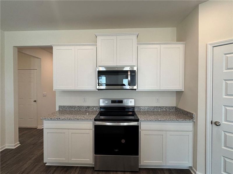 Furnished interior view inside a new home in Oakchase at Hampton, Hampton (Image 8).