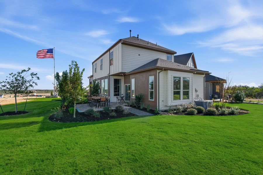 Exterior details and patio area of a home in Prominence, San Antonio (Image 30).