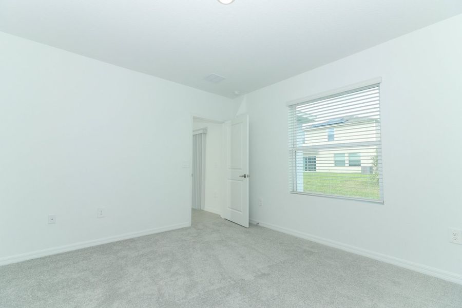 Spacious, unfurnished interior of a new home in Marion Creek, Haines City (Image 19).