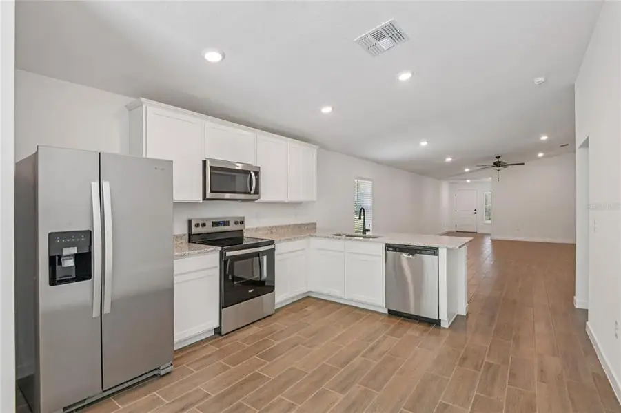 Furnished interior view inside a new home in Royal Highlands, Weeki Wachee (Image 3).