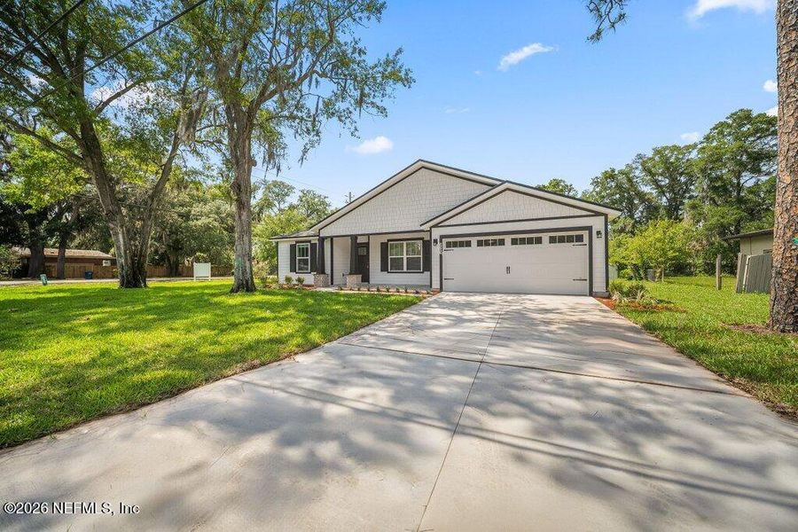 Front exterior of a new home in , Jacksonville, FL, highlighting curb appeal (Image 25).