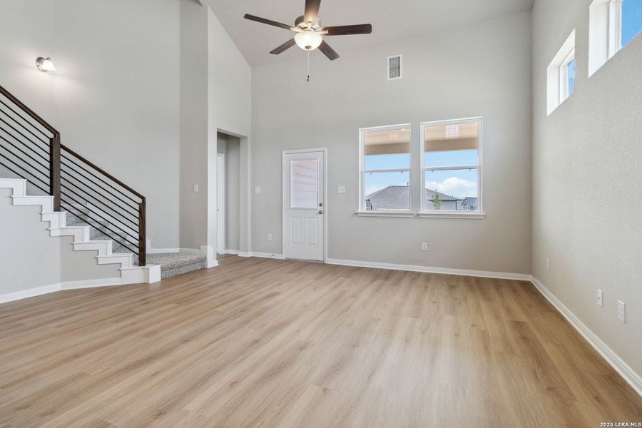 Spacious, unfurnished interior of a new home in Hunters Ranch, San Antonio (Image 6).