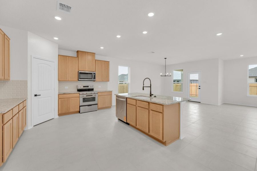 Furnished interior view inside a new home in Mustang Valley, Manor (Image 11).