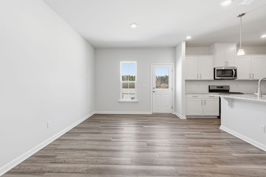 Spacious, unfurnished interior of a new home in Poets Walk, Whitsett (Image 16).