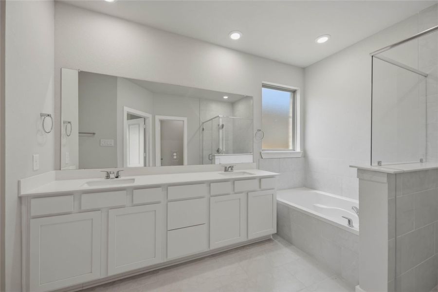 Furnished interior view inside a new home in Sunterra 40, Katy (Image 7).