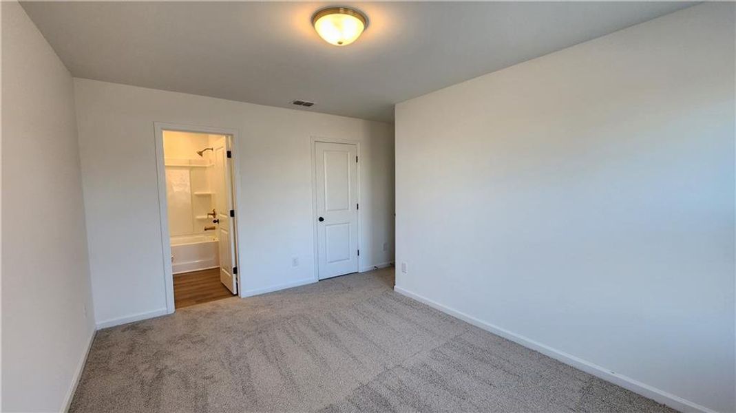 Spacious, unfurnished interior of a new home in The Estates at Casteel, Bethlehem (Image 15).