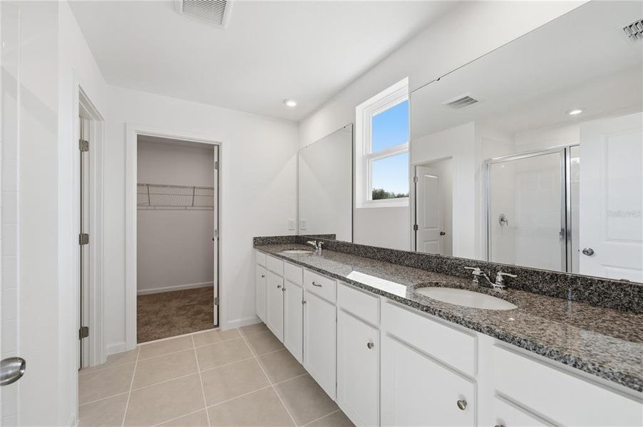 Furnished interior view inside a new home in Rainwood, Clermont (Image 13).