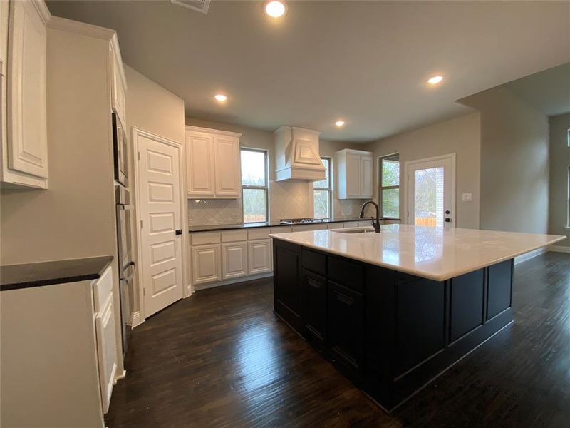 Modern vibe with white cabinets, Black Pearl granite & herringbone white subway tile backsplash Modern vibe with white cabinets, Black Pearl granite & herringbone white subway tile backsplash