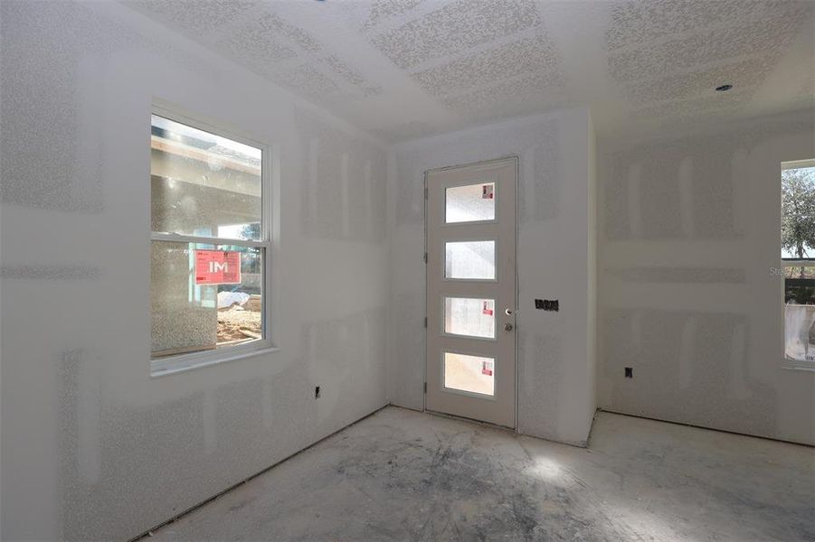 In-progress construction of a new home in Lake Star at Ovation, Winter Garden, FL (Image 29).