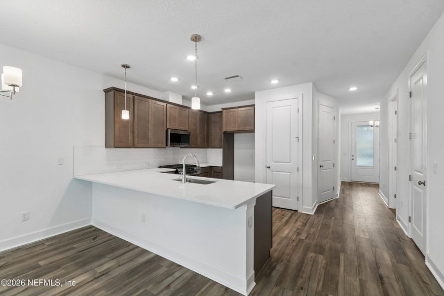 Furnished interior view inside a new home in Westerly Park at Wildlight – Overlook Collection, Yulee (Image 8).