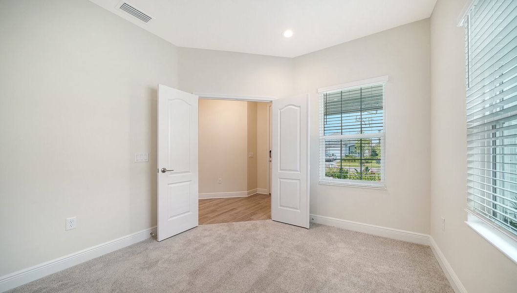 Spacious, unfurnished interior of a new home in Wildleaf at North River Ranch, Parrish (Image 27).