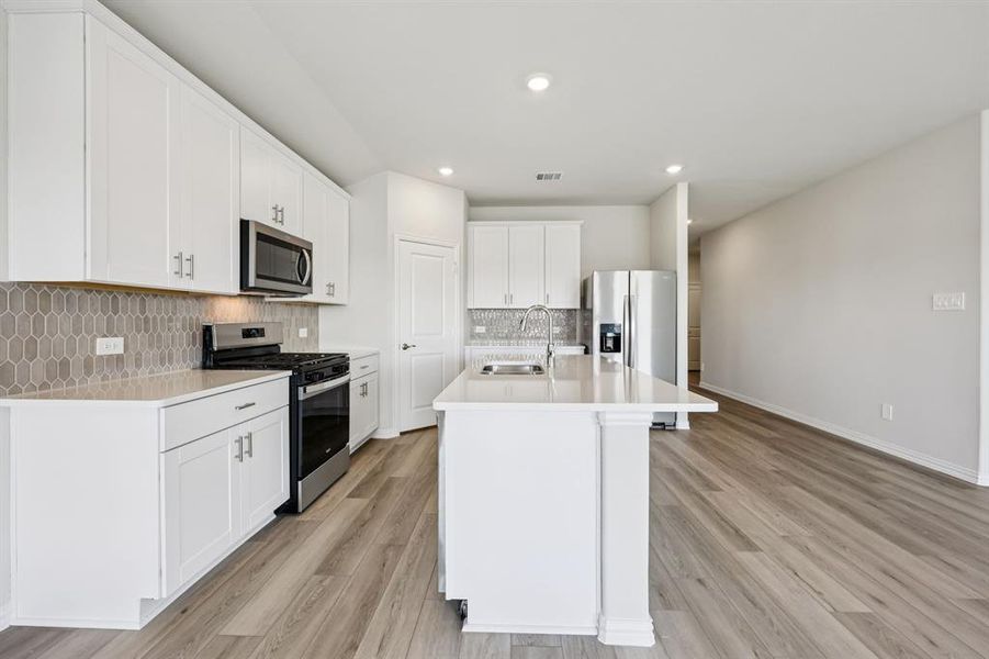 Furnished interior view inside a new home in Trails of Lavon - Signature Series, Lavon (Image 14). Furnished interior view inside a new home in Trails of Lavon - Signature Series, Lavon (Image 14).