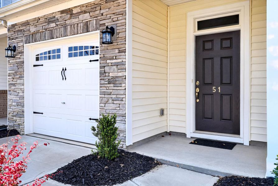 Exterior details and patio area of a home in Fairview Village Townhomes, Simpsonville (Image 3). Exterior details and patio area of a home in Fairview Village Townhomes, Simpsonville (Image 3).