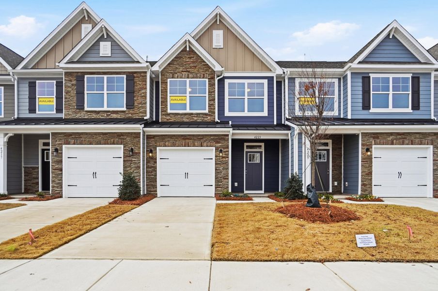 Front exterior of a new home in Harrisburg Village Townhomes, Harrisburg, NC, highlighting curb appeal (Image 28).