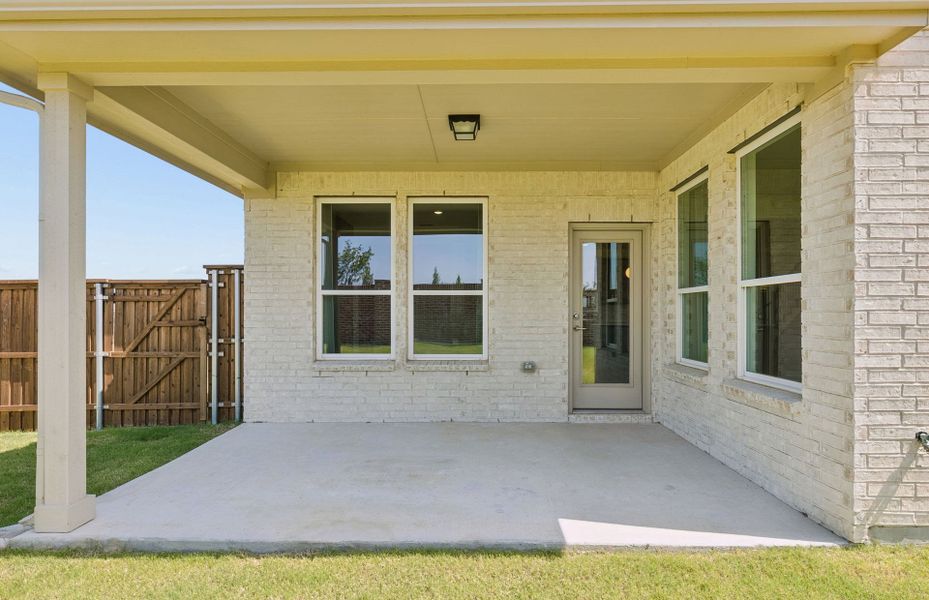 Exterior details and patio area of a home in Pinnacle at Legacy Hills, Celina (Image 3).