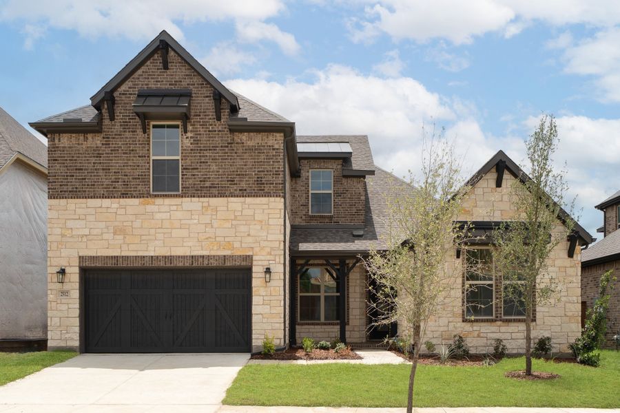 Front exterior of a new home in Enclave at Legacy Hills, Celina, TX, highlighting curb appeal (Image 1). Front exterior of a new home in Enclave at Legacy Hills, Celina, TX, highlighting curb appeal (Image 1).