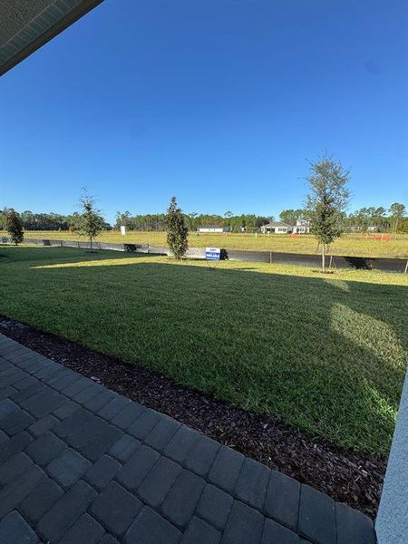 Exterior details and patio area of a home in Ridgehaven, Ormond Beach (Image 17).