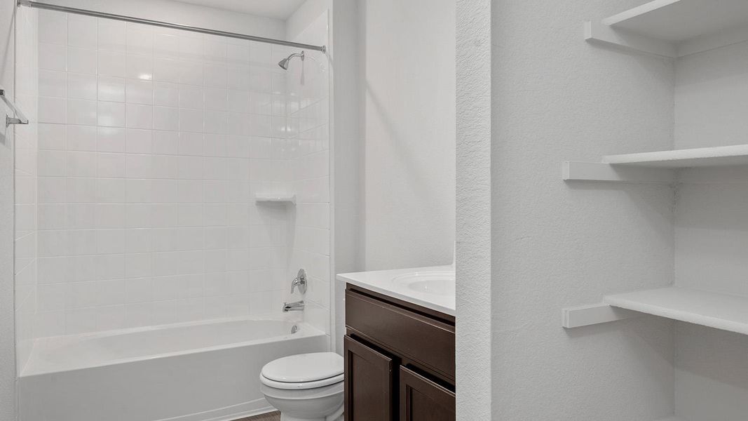 Full bathroom featuring vanity and shower / bath combination