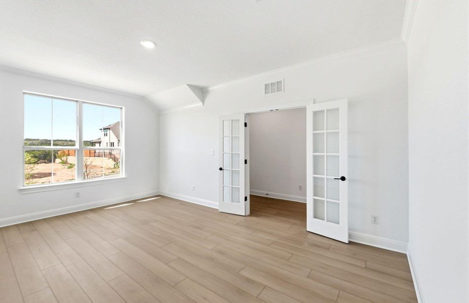 Spacious, unfurnished interior of a new home in West Cypress Hills, Spicewood (Image 16).