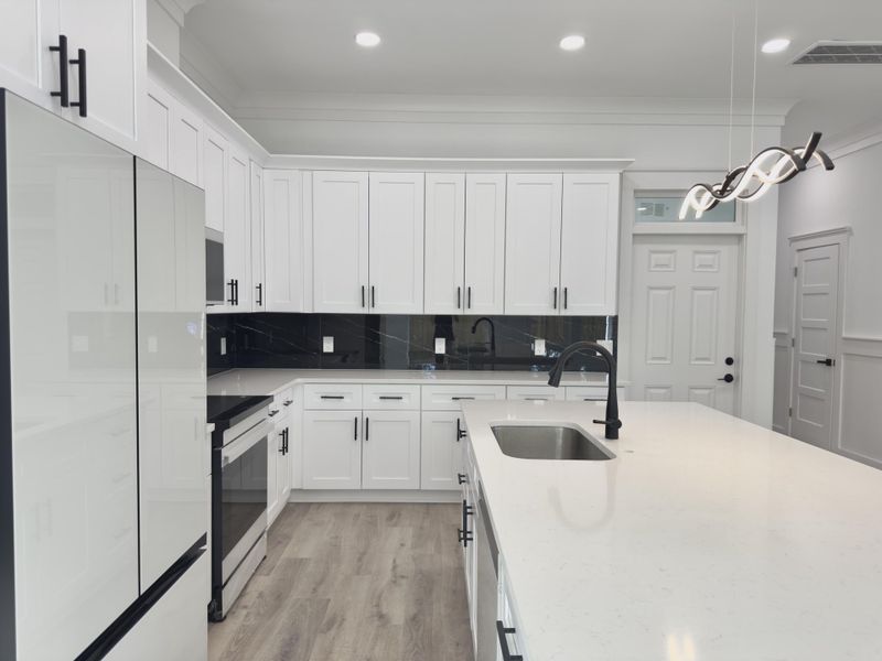 Furnished interior view inside a new home in , North Charleston (Image 8).