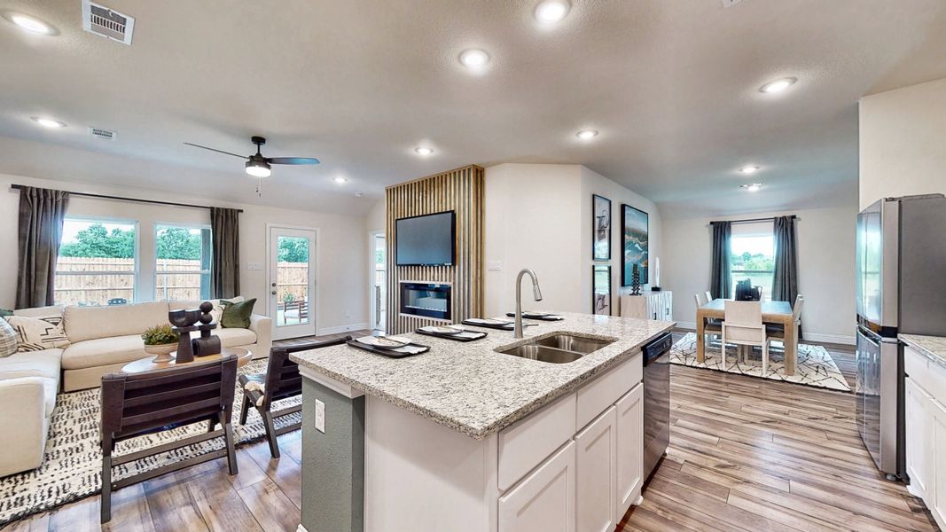 A kitchen and living room. A kitchen and living room.