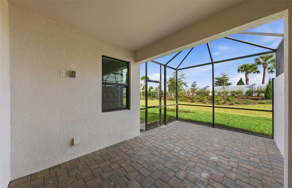Exterior details and patio area of a home in Talon Preserve on Palmer Ranch, Nokomis (Image 28).
