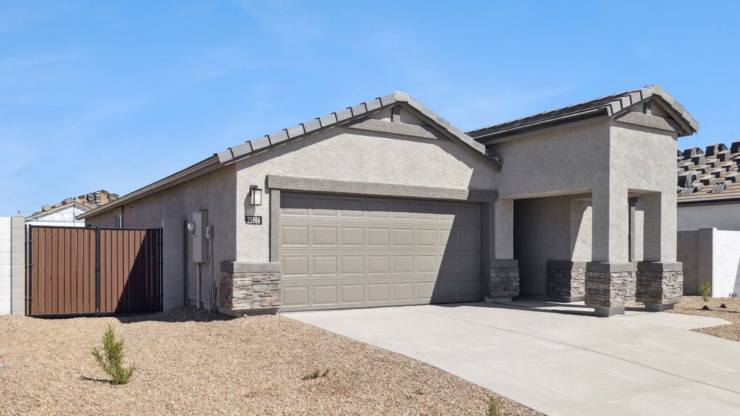 Representative exterior photo of a completed home built from the Gaven by D.R. Horton in Remington, Buckeye, AZ (Image 16). Representative exterior photo of a completed home built from the Gaven by D.R. Horton in Remington, Buckeye, AZ (Image 16).