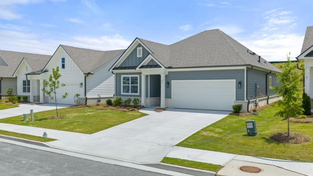 Front exterior of a new home in Hamptons at Riverwood North, Dallas, GA, highlighting curb appeal (Image 47).