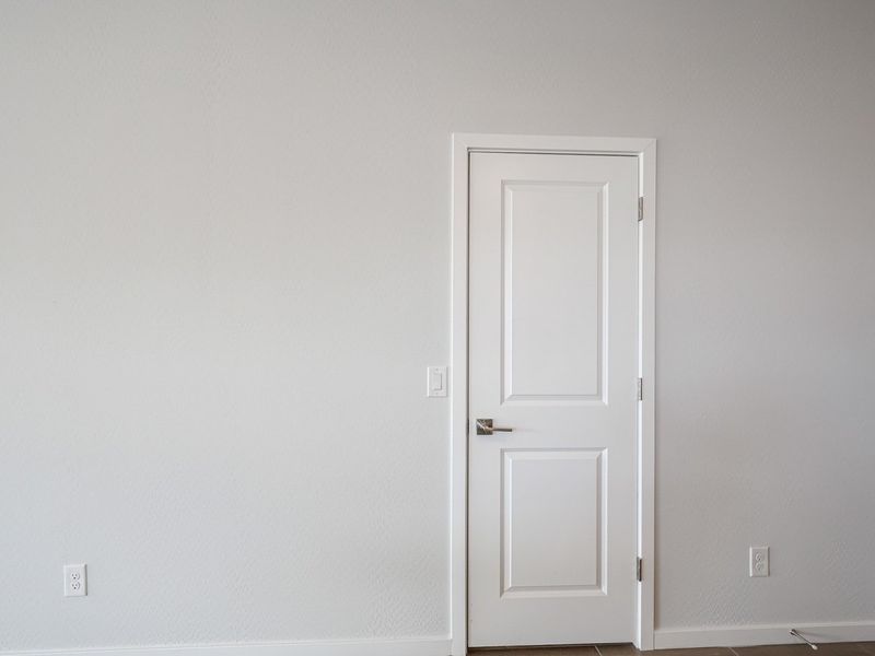 A white door in a room.