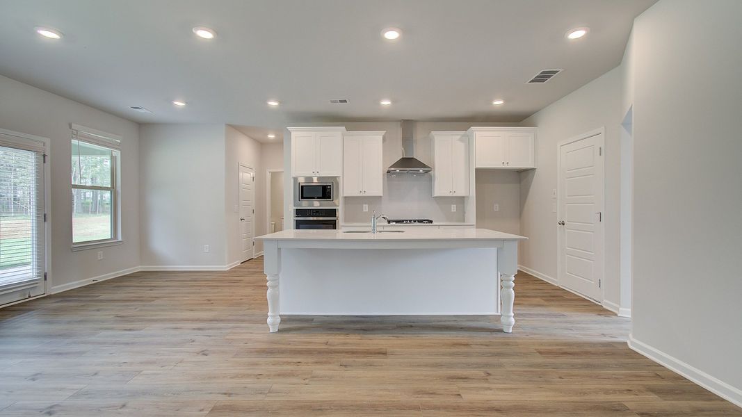 Representative furnished interior of a home built from the Meridian II by DRB Homes in Northcroft, Loganville (Image 10).