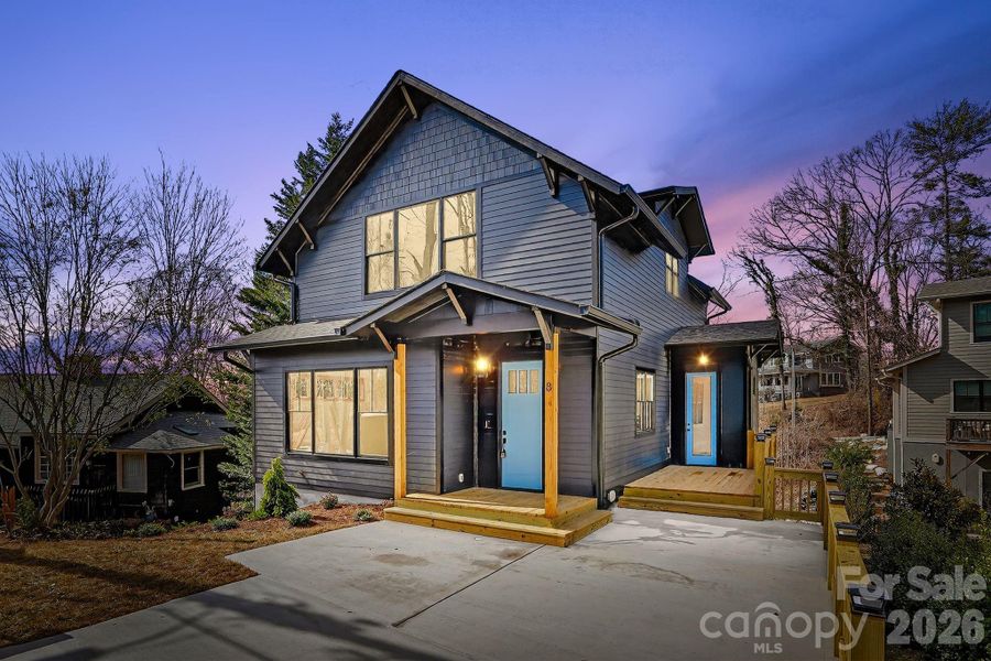 Front exterior of a new home in , Asheville, NC, highlighting curb appeal (Image 25).