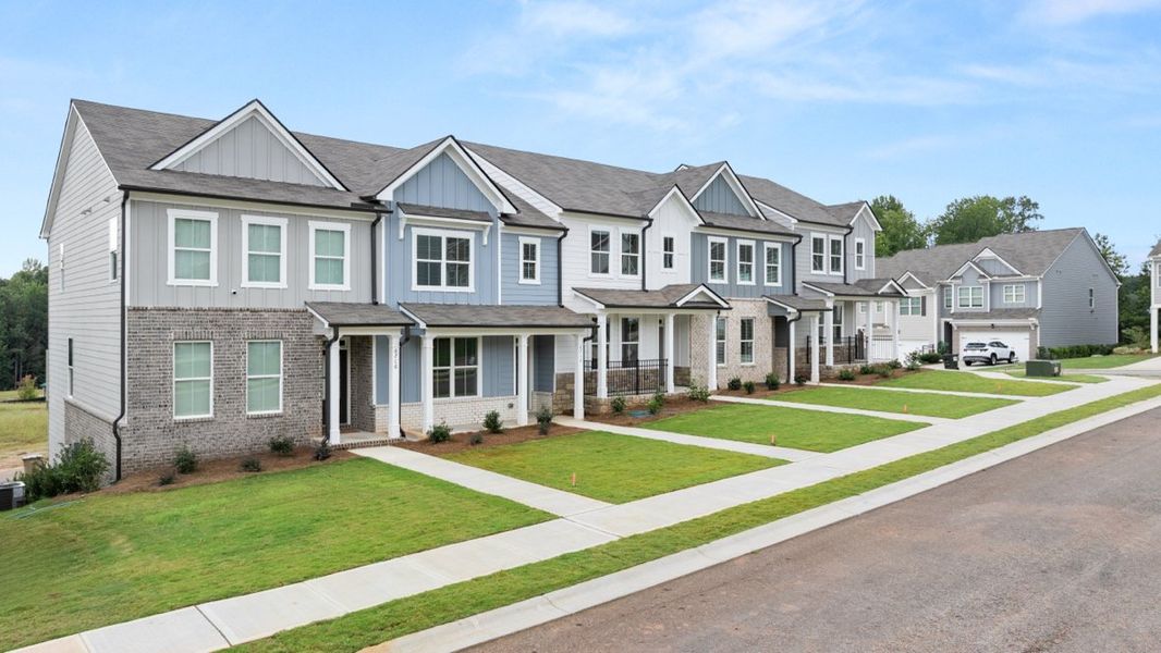 Representative exterior photo of a completed home built from the Addington by D.R. Horton in Waypoint, Flowery Branch, GA (Image 2). Representative exterior photo of a completed home built from the Addington by D.R. Horton in Waypoint, Flowery Branch, GA (Image 2).