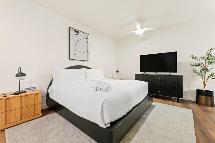 Gleaming wood floors anchor this clean, inviting private space. Gleaming wood floors anchor this clean, inviting private space.