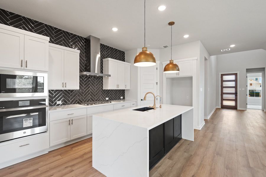 Furnished interior view inside a new home in Wolf Ranch, Georgetown (Image 12).