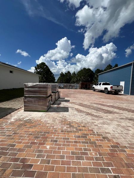 Front exterior of a new home in , Palm Bay, FL, highlighting curb appeal (Image 2).