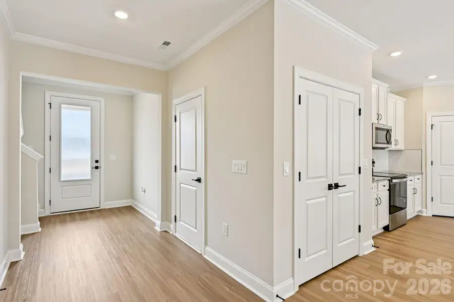 Spacious, unfurnished interior of a new home in Colonial Crossing, Troutman (Image 11).