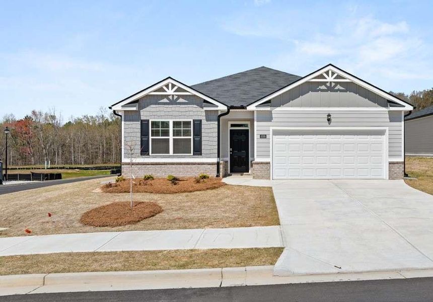 Front exterior of a new home in Champion's Run, Lithonia, GA, highlighting curb appeal (Image 1). Front exterior of a new home in Champion's Run, Lithonia, GA, highlighting curb appeal (Image 1).