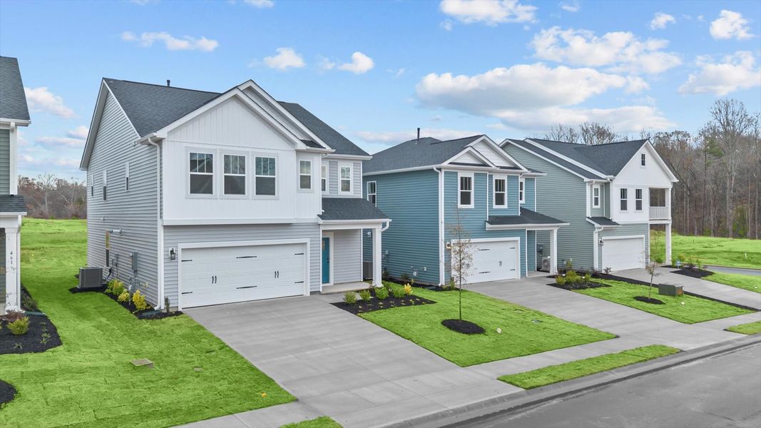 Front exterior of a new home in Harrier Point, Woodruff, SC, highlighting curb appeal (Image 1).