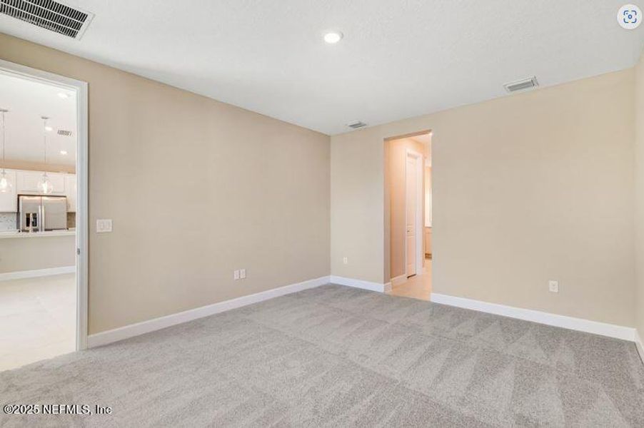 Spacious, unfurnished interior of a new home in Colbert Landings, Palm Coast (Image 8).