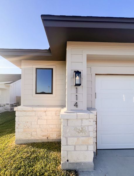 Exterior details and patio area of a home in TerraVista, Victoria (Image 3).