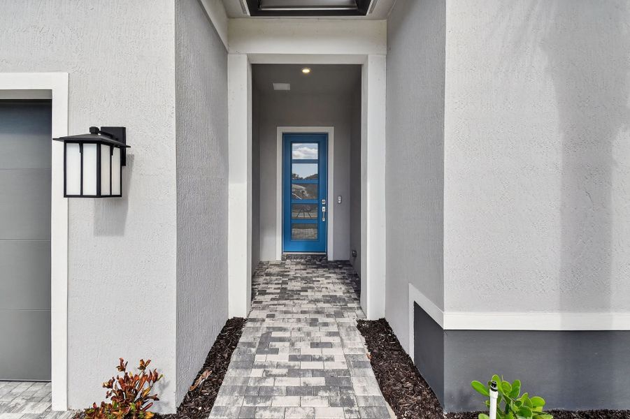 Exterior details and patio area of a home in Greyhawk Landing, Lake Worth (Image 24).