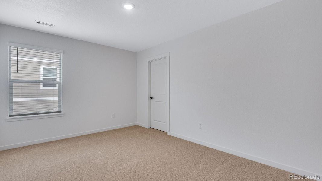 Spacious, unfurnished interior of a new home in Trails at Crowfoot, Parker (Image 27).