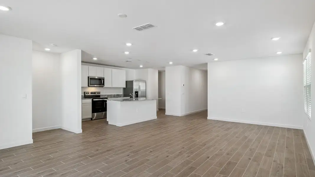 Spacious, unfurnished interior of a new home in Remington, Buckeye (Image 12). Spacious, unfurnished interior of a new home in Remington, Buckeye (Image 12).