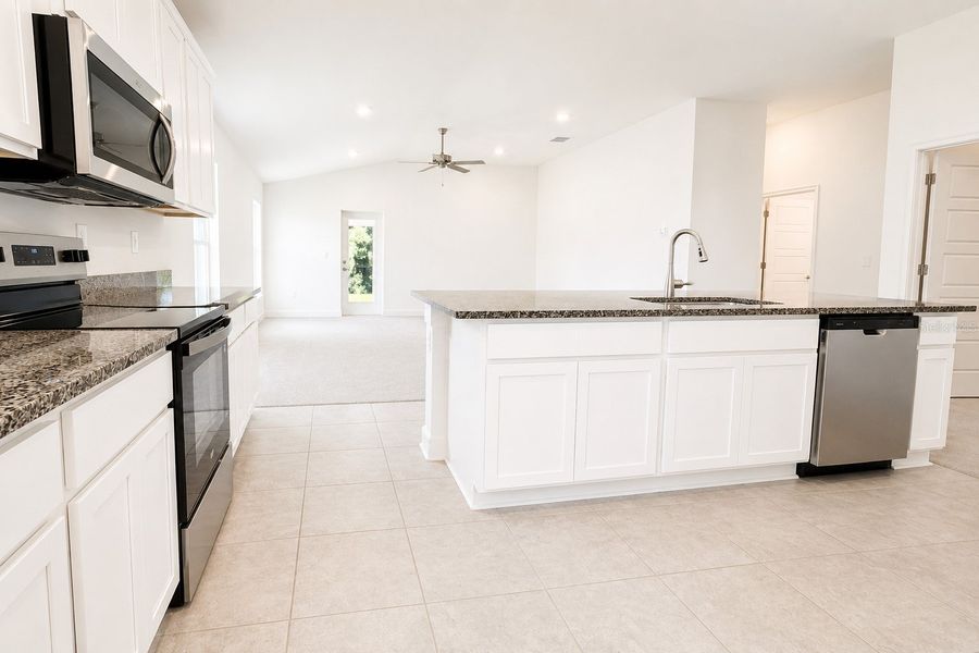 Furnished interior view inside a new home in Harmony Central, St. Cloud (Image 7).