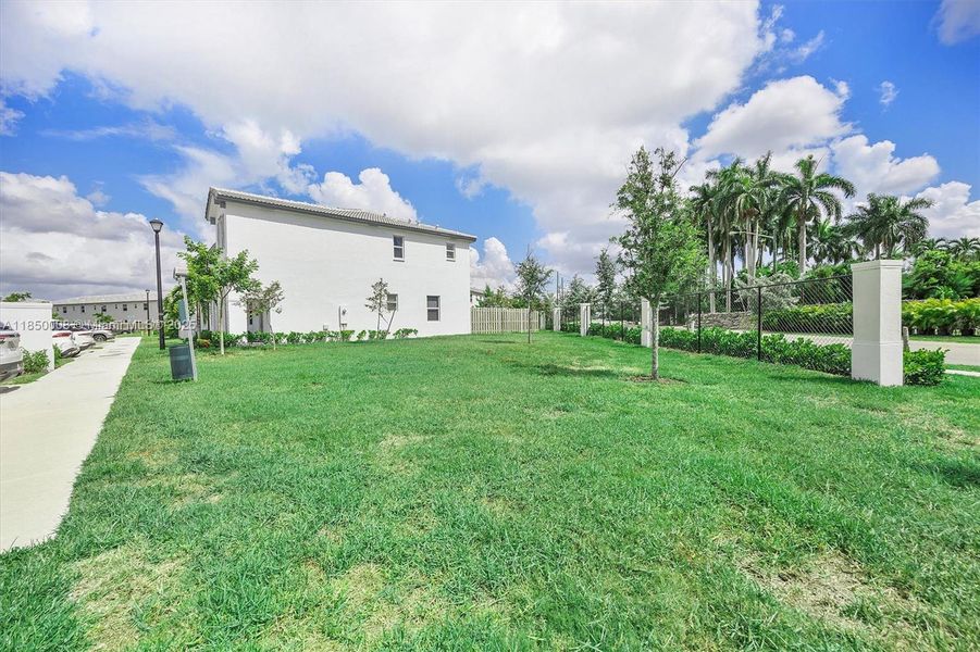 Front exterior of a new home in , Homestead, FL, highlighting curb appeal (Image 19).