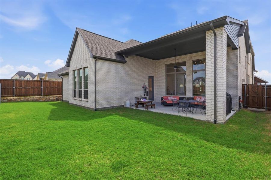 Exterior details and patio area of a home in The Homestead - 62', Rockwall (Image 3).