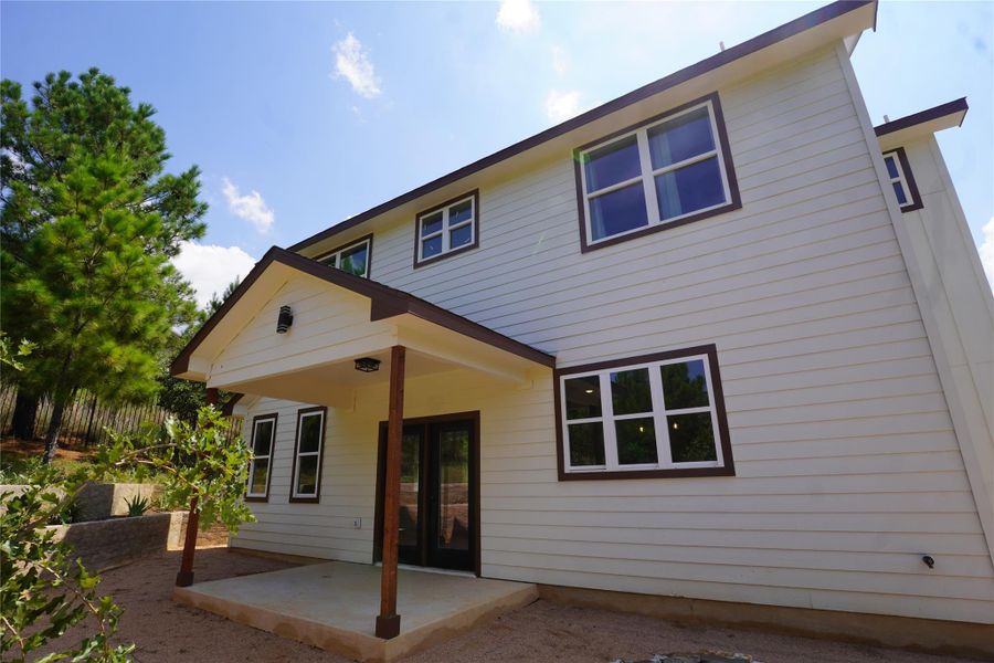 Front exterior of a new home in , Bastrop, TX, highlighting curb appeal (Image 20).