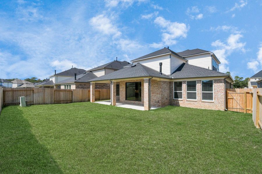 Explore the expansive backyard with its inviting covered patio—a perfect blend of space for the kids to play and adults to unwind. Ideal for creating your outdoor oasis, this backyard accommodates patio furniture, a BBQ pit, and endless possibilities for leisure and entertainment. Explore the expansive backyard with its inviting covered patio—a perfect blend of space for the kids to play and adults to unwind. Ideal for creating your outdoor oasis, this backyard accommodates patio furniture, a BBQ pit, and endless possibilities for leisure and entertainment.