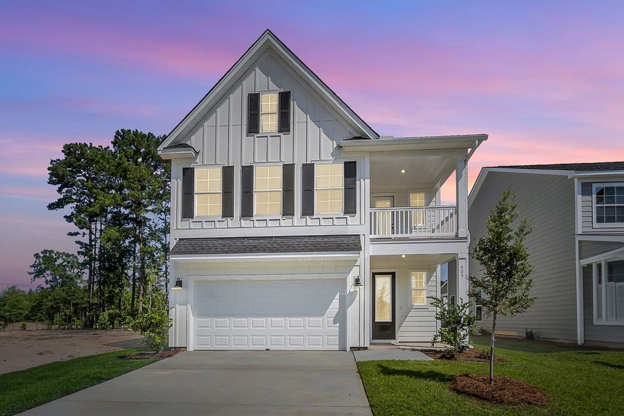 Front exterior of a new home in Pineland Preserve, Summerville, SC, highlighting curb appeal (Image 1). Front exterior of a new home in Pineland Preserve, Summerville, SC, highlighting curb appeal (Image 1).